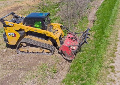 Skid Steer Attachment on a Cat299